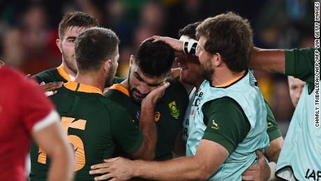 South African players celebrate Damian de Allende&#39;s try. 