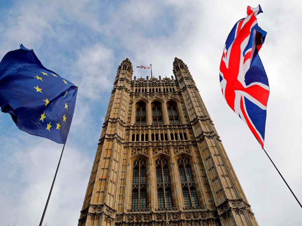 PHOTO: EU and Union flags flutter in the breeze in front of the Victoria Tower, part of the Palace of Westminster in central London, Oct. 17, 2019.