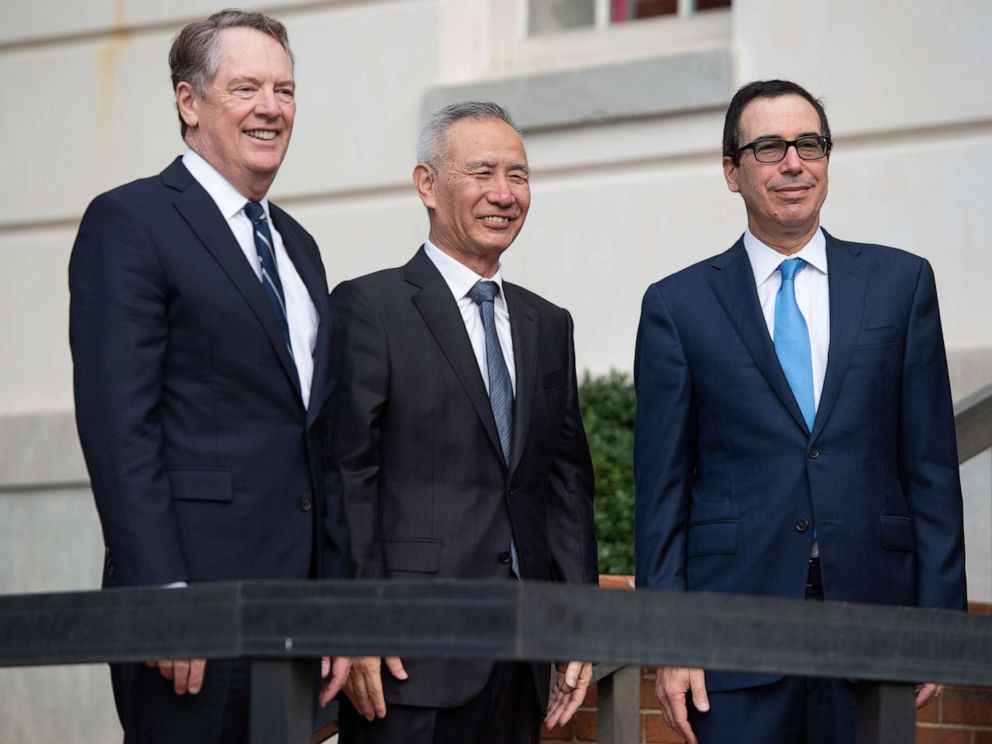 PHOTO: Treasury Secretary Steven Mnuchin (R) and Trade Representative Robert Lighthizer (L) greet Chinese Vice Premier Liu He as he arrives for trade talks at the Office of the U.S. Trade Representative in Washington, D.C., Oct. 10, 2019.