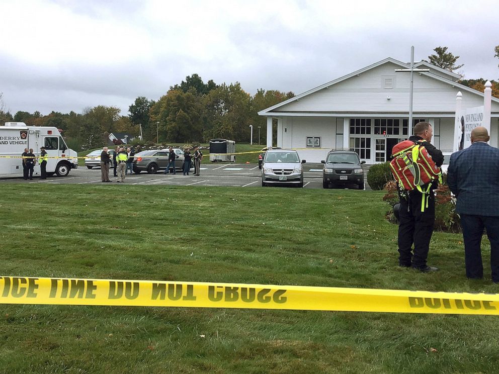 PHOTO: In this photo provided by WMUR-TV, police stand outside the New England Pentecostal Church after reports of a shooting on Oct. 12, 2019, in Pelham, N.H.