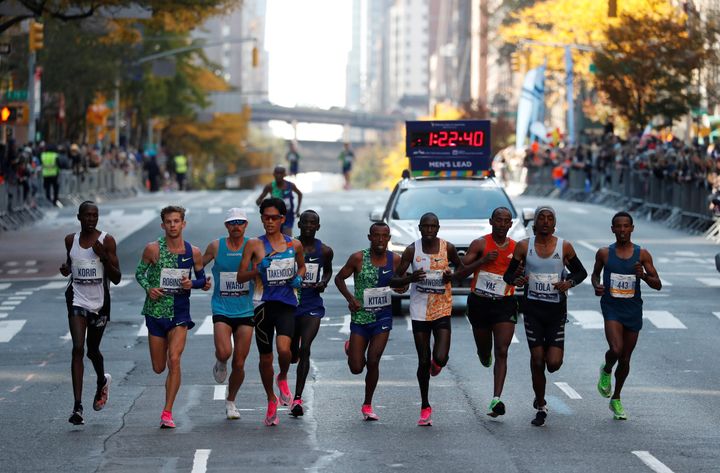 Kenya's Geoffrey Kamworor and the rest of the leading pack in action during the elite men's race.