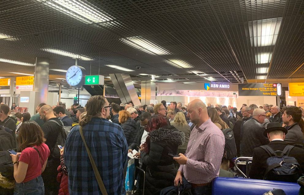 PHOTO: Passengers stand inside Amsterdams Schiphol Airport during a security alert, Netherlands, Nov. 6, 2019, in this picture obtained from social media.