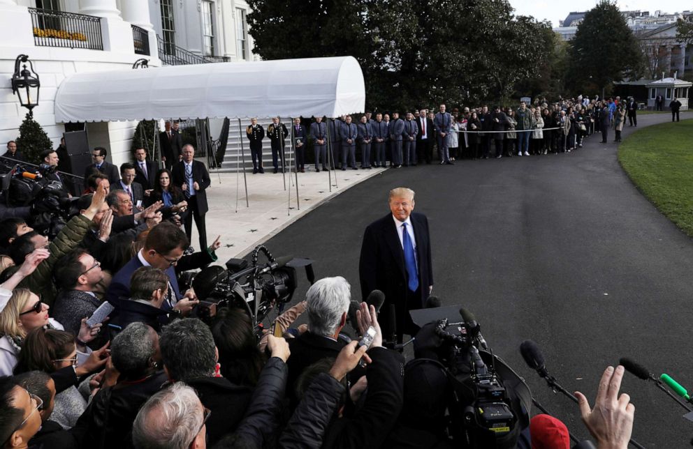 PHOTO: President Donald Trump speaks to the news media before boarding Marine One to depart for travel to Georgia from the South Lawn of the White House in Washington, D.C., Nov. 8, 2019.