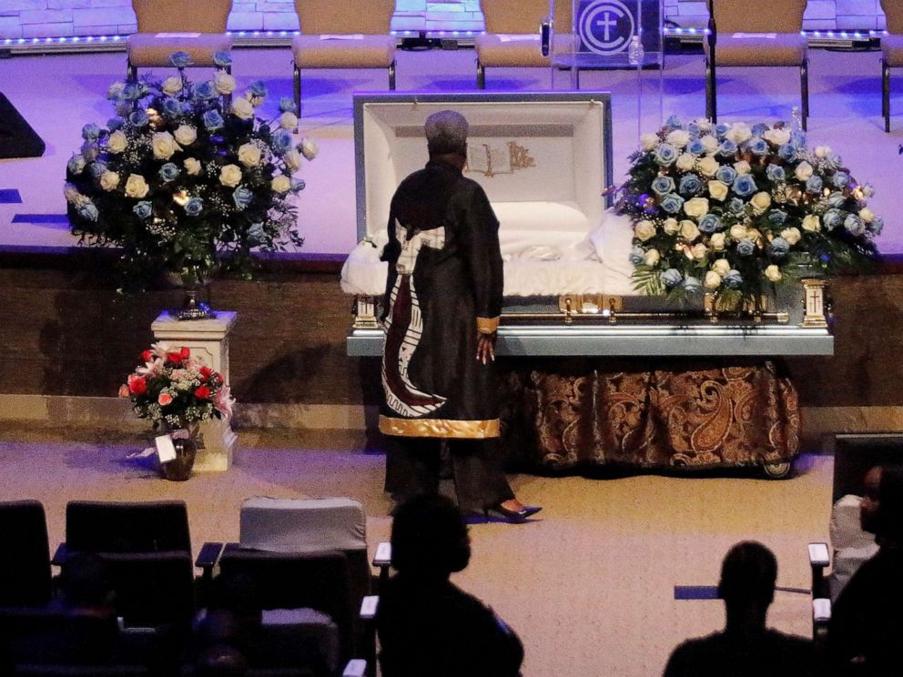 PHOTO: DALLAS, TX - OCTOBER 24: A mourner pays respects before the start of the funeral service for Atatiana Jefferson on October 24, 2019, at Concord Church in Dallas, Texas. (Photo by Stewart F. House/Getty Images)