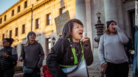 Carolina Fung Feng, 30, leads protesters in a chant in Media, Pennsylvania. Fung Feng is among the DACA recipients who are suing the government over the administration&#39;s decision to end the program.