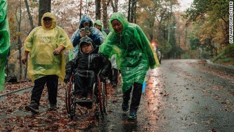 At points in the journey from New York to Washington, torrential rains have drenched demonstrators.