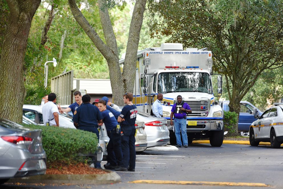 PHOTO: Law enforcement investigators with the JSO mobile command center in the Southside Villas apartment complex off Southside Blvd. in Jacksonville, Fla., Nov. 6, 2019.