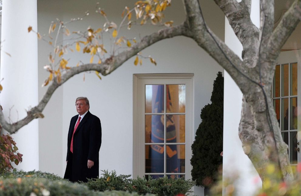 PHOTO: President Donald Trump walks out of the Oval Office headed to the Marine One helicopter to depart for travel to Fla., from the South Lawn of the White House in Washington, Nov. 26, 2019.
