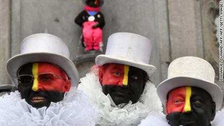 The &quot;Noirauds&quot; or &quot;Blackies&quot; -- a group that marks Belgium&#39;s annual carnival season by charitable fund-raising in black face paint -- changed their colours to resemble the Belgian flag in 2019.