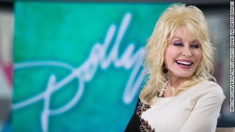 Country queen Dolly Parton makes a surprise appearance at the Newport Folk Festival 