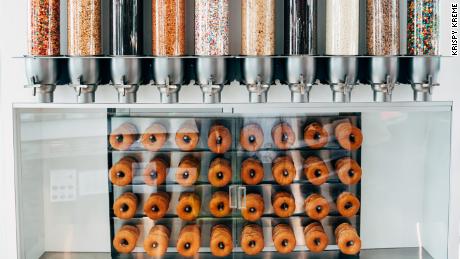 Krispy Kreme is redesigning its stores for the first time in a decade and making its menu even more sugary