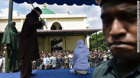 Indonesian teens publicly flogged for cuddling