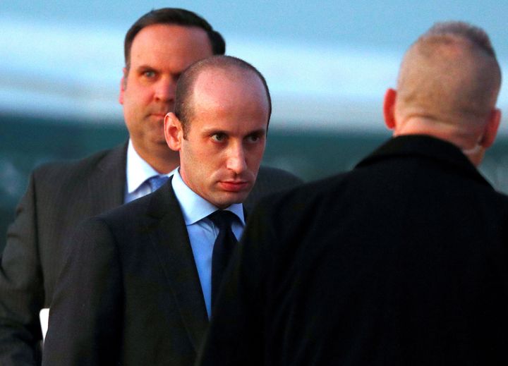 White House senior policy adviser Stephen Miller and White House director of social media Dan Scavino board Air Force One to 