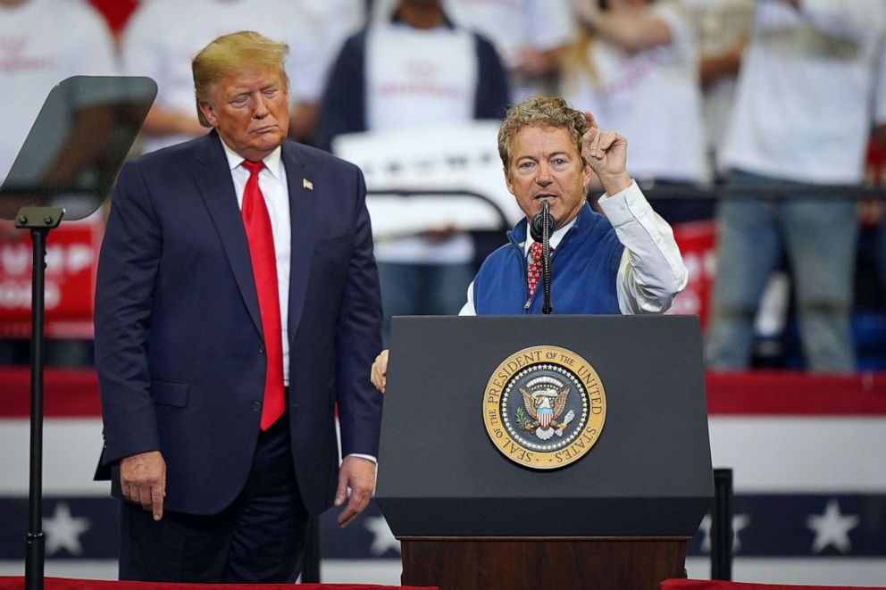 PHOTO: President Donald Trump looks on as Sen. Rand Paul speaks at a campaign rally at the Rupp Arena, Nov. 4, 2019, in Lexington, Kentucky.