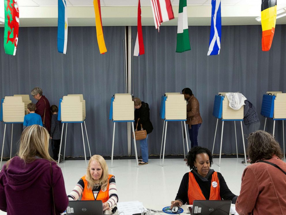 PHOTO: Voters cast their ballots to vote in state and local elections at Robious Middle School in Midlothian, a suburb of Richmond, Virginia, Nov. 5, 2019.