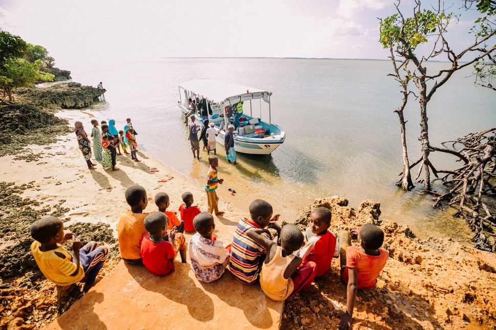 The Safari Doctors team packs medicines in boats and travels to remote villages where health care is a luxury.