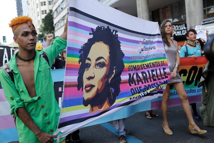 Protesters carry the image of slain councilwoman Marielle Franco in Rio de Janeiro on Sept. 7, 2019.&nbsp;