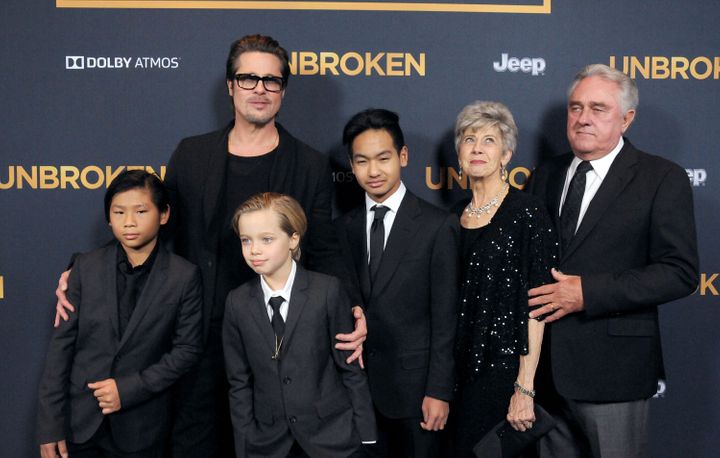 Brad Pitt arrives at the premiere of "Unbroken" with children Pax, Shiloh, Maddox and parents Jane Pitt and William Pitt in 2