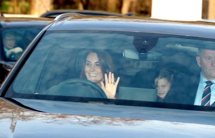 The Duchess of Cambridge and her daughter, Princess Charlotte, arrive for the Queen's Christmas lunch.&nbsp;