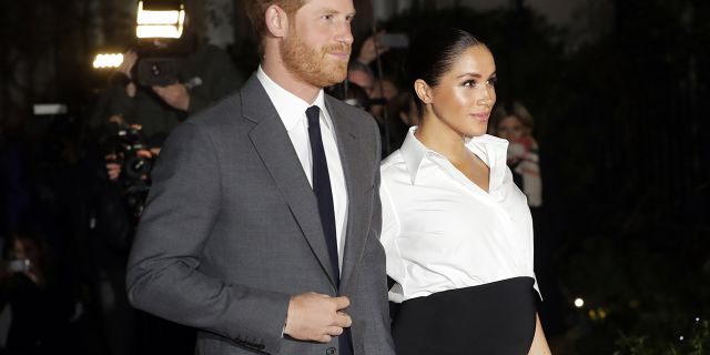 In this Feb. 7, 2019 file photo, Britain's Prince Harry and Meghan, Duchess of Sussex arrive at the annual Endeavour Fund Awards in London.