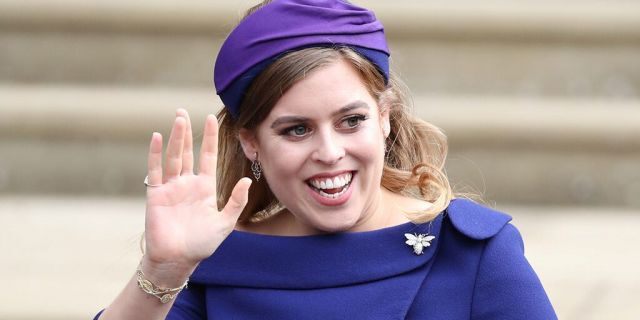 Princess Beatrice arrives for the wedding of Princess Eugenie to Jack Brooksbank at St George's Chapel in Windsor Castle.