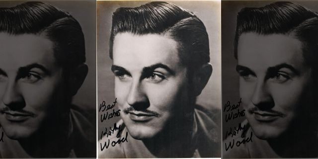 A photo of Ed Wood signed by Kathy Wood.