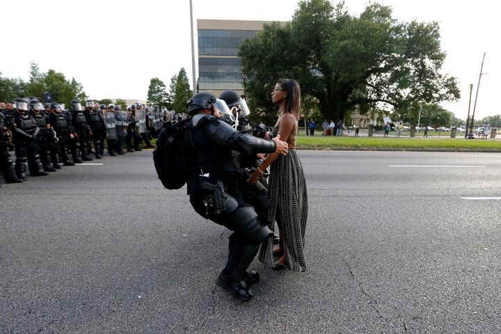 Ieshia Evans is detained by law enforcement on July 9, 2016, as she protests the shooting death of Alton Sterling near the he