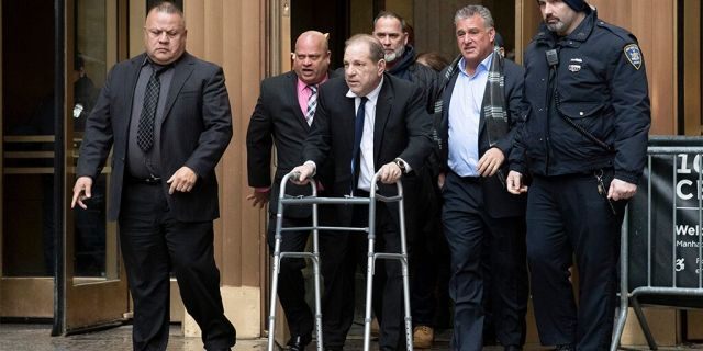 Harvey Weinstein, center, leaves court following a hearing in New York. In an interview published Sunday, Dec. 15 in the New York Post, Weinstein said he is a pioneer in advancing the careers of women in the film industry and that his work has been forgotten in the wake of allegations of sexual assault.