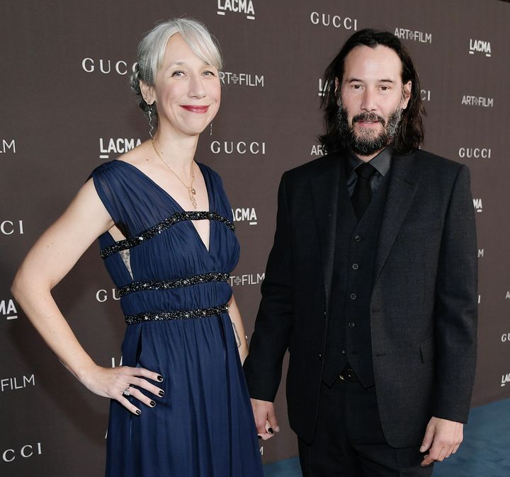 Alexandra Grant and Keanu Reeves hold hands at a Los&nbsp; 2019 LACMA 2019 Art + Film Gala in November.