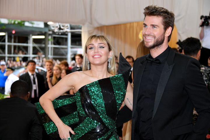 Miley Cyrus and Liam Hemsworth attend the 2019 Met Gala Celebrating Camp: Notes on Fashion at Metropolitan Museum of Art in M