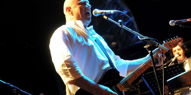 Neil Innes, as Ron Nasty, of The Rutles performs live on stage at the Islington Academy on May 22, 2014 in London, United Kingdom. 