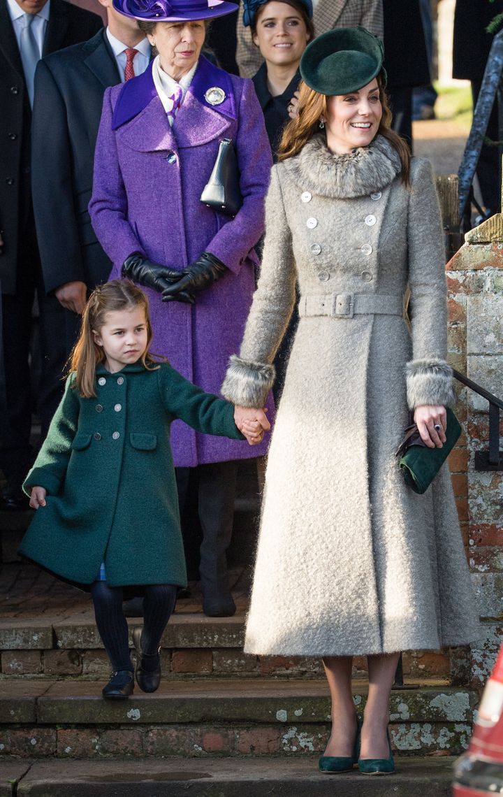 Princess Charlotte curtsies to the queen as she attends the Christmas Day church service at the Church of St Mary Magdalene o