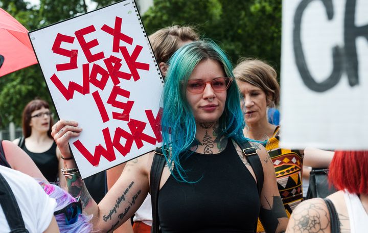 Sex workers and activists protest outside Parliament in London in July 2018, arguing that Britain should not follow the SESTA