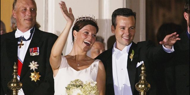 Wedding of Princess Martha Louise and Ari Behn in Trondheim, Norway on May 24, 2002 - Martha Louise and Ari Behn with their guest at the balcony for looking at a firework, left to right: King Harald, Martha Louise, Ari Behn.