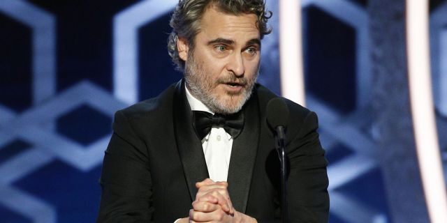 This image released by NBC shows Joaquin Phoenix accepting the award for best actor in a motion picture drama for his role in "Joker" at the 77th Annual Golden Globe Awards at the Beverly Hilton Hotel in Beverly Hills, Calif., on Sunday, Jan. 5, 2020.