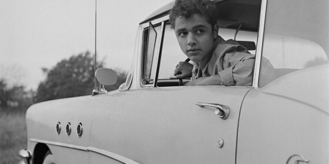 An early snapshot of Sal Mineo at home in The Bronx, New York.