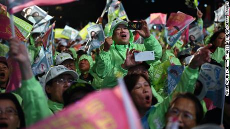 Supporters of Taiwan&#39;s current president and Democratic Progressive Party presidential candidate, Tsai Ing-wen, cheer at a rally in Taoyuan on January 8, 2020.