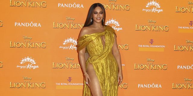 Singer Beyonce poses for photographers upon arrival at the 'Lion King' European premiere in central London, Sunday, July 14, 2019. Her original song for the film failed to score on Oscars nom.