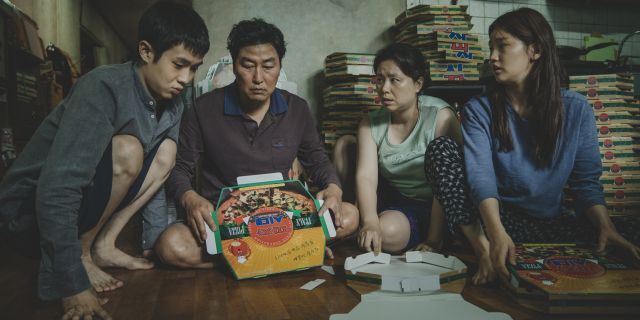 This image released by Neon shows Woo-sik Choi, from left, Kang-ho Song, Hye-jin Jang and So-dam Park in a scene from "Parasite."