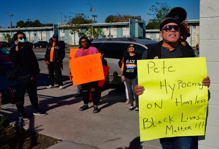 Activists with Black Lives Matter protest Pete Buttigieg's visit to a Bridge Home Project homeless shelter in Los Angeles on 