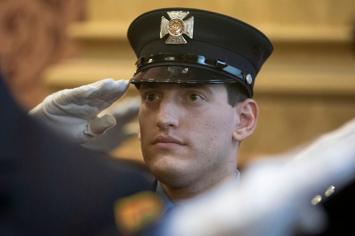 Photographs released by the Jersey City Mayor&rsquo;s Office show Sam Springsteen saluting during his swearing-in.