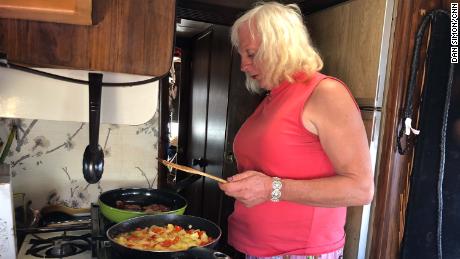 Megan Sue Belafonte prepares breakfast in an RV.