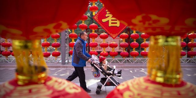 China's most festive holiday began in the shadow of a worrying new virus Saturday as the death toll grew, an unprecedented lockdown kept 36 million people from traveling and authorities canceled a host of Lunar New Year events.