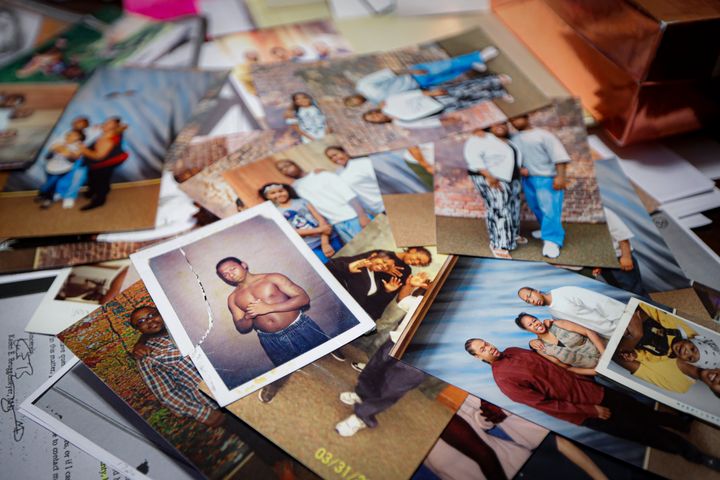 Family photos of Myon Burrell during his teenage years before and after incarceration are displayed a the home of his sister,