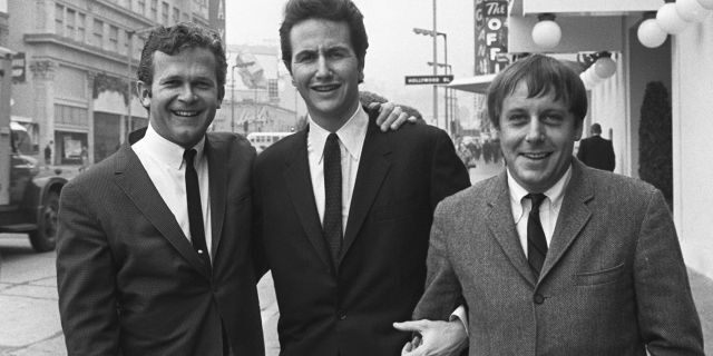 In this Jan. 31, 1967, file photo, members of the Kingston Trio, from left: Bob Shane, John Stewart and Nick Reynolds are pictured in the Hollywood section of Los Angeles. Shane, the last surviving original member of the popular folk group the Kingston Trio and the lead singer on its million-selling ballad “Tom Dooley” and many other hits, died Sunday, Jan. 26, 2020, in Phoenix. He was 85. 