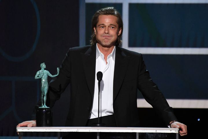 Brad Pitt accepts the award for Outstanding Performance by a Male Actor in a Supporting Role in a Motion Picture at the 26th 