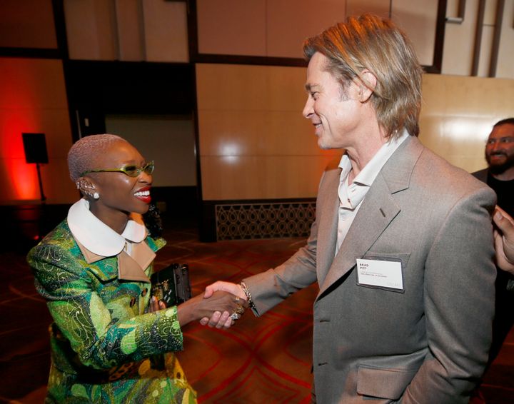 Cynthia Erivo, left, shakes hands with Brad Pitt at the 92nd Academy Awards Nominees Luncheon at the Loews Hotel on Monday, J