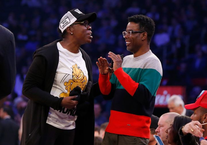 Leslie Jones and Chris Rock attend a game between the New York Knicks and the Golden State Warriors at Madison Square Garden 