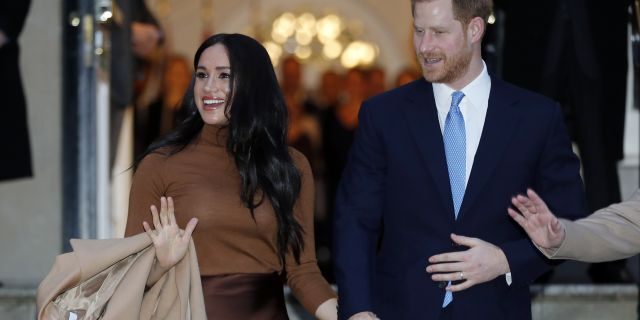 Britain's Prince Harry and Meghan, Duchess of Sussex leave after visiting Canada House in London, Tuesday Jan. 7, 2020, after their recent stay in Canada.