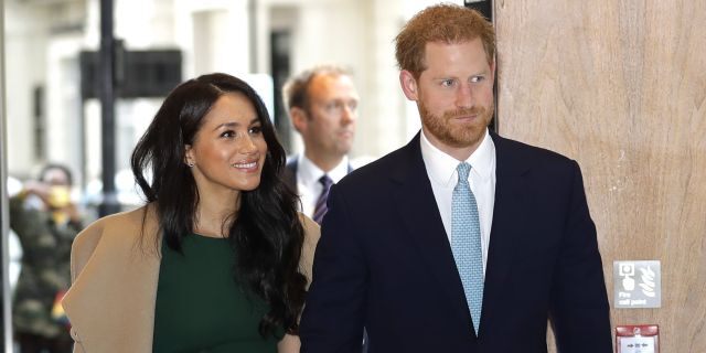 Britain's Prince Harry and Meghan, the Duke and Duchess of Sussex arrive to attend the WellChild Awards Ceremony in London, Tuesday, Oct. 15, 2019.